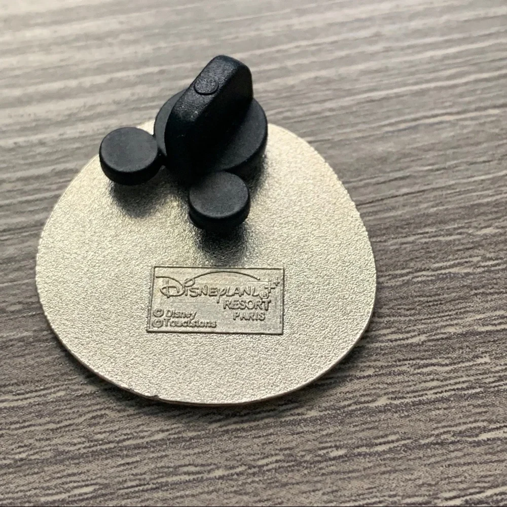 Disney frown pin